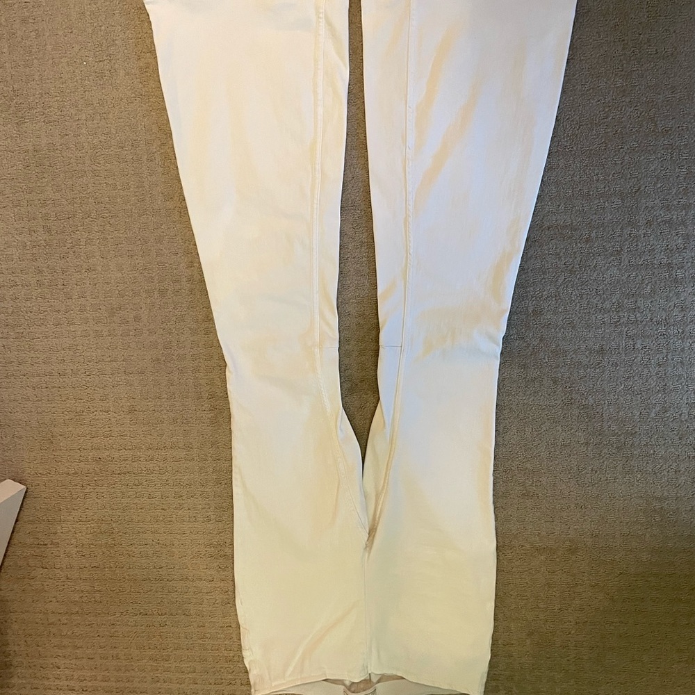 Free People white bell bottom jeans (the dark blue ones are sold). Worn once